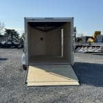 A 7x16ft new Bravo Scout 7K Enclosed Cargo Box Trailer