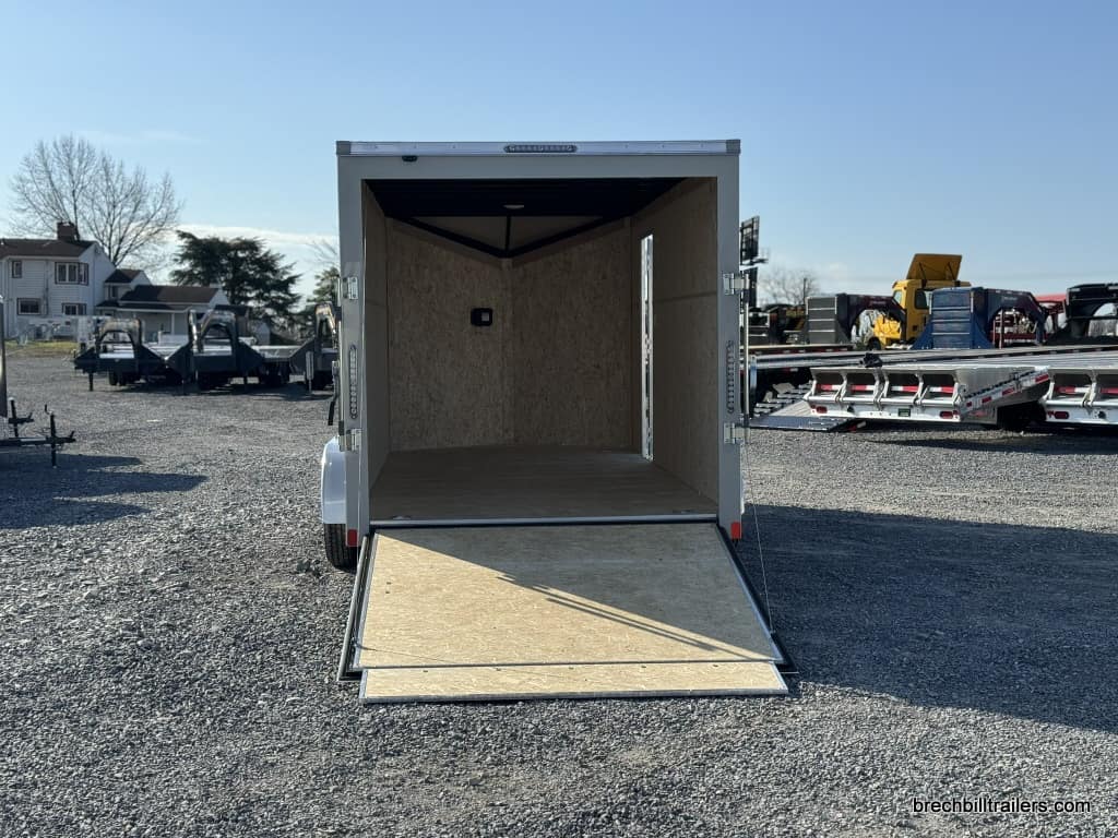A 7x16ft new Bravo Scout 7K Enclosed Cargo Box Trailer
