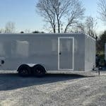 Side view of a new Bravo Scout 7K Enclosed Cargo Box Trailer