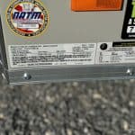 Manufacturer sticker with trailer info.