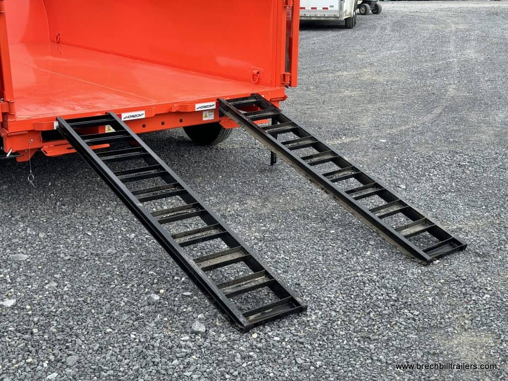 Black ramps on the ground for easy loading.