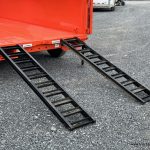 Black ramps on the ground for easy loading.