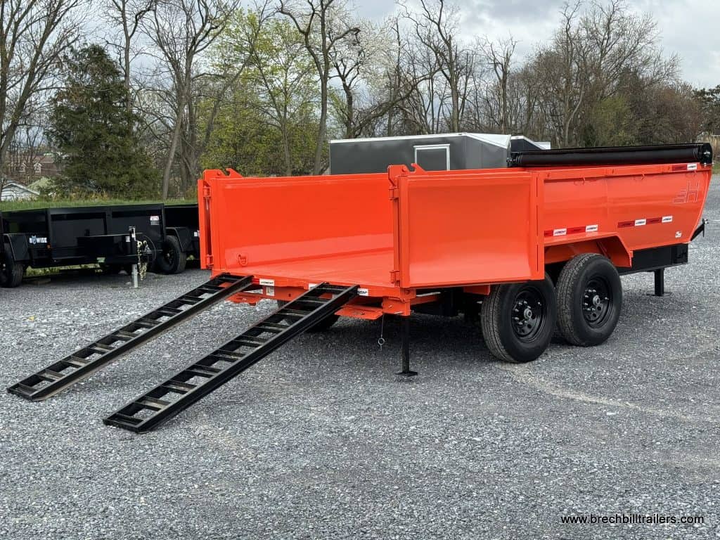 A brand new orange Horizon 14k Dump Trailer High Side
