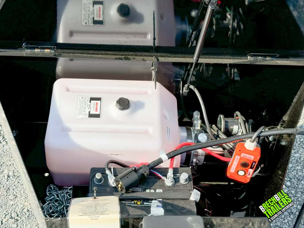 Battery box with hydraulic system and trailer hookup line.