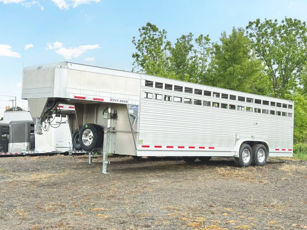 A 26ft long EBY 19K Ruff Neck Livestock Trailer