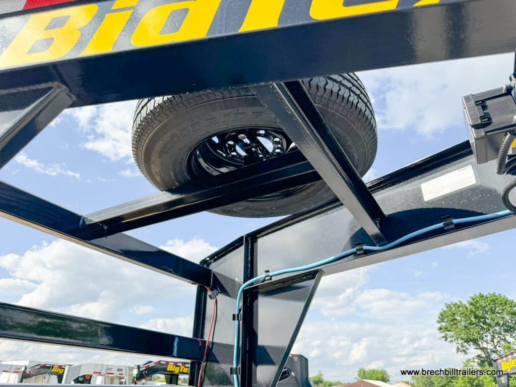 A spare wheel mounted on the gooseneck