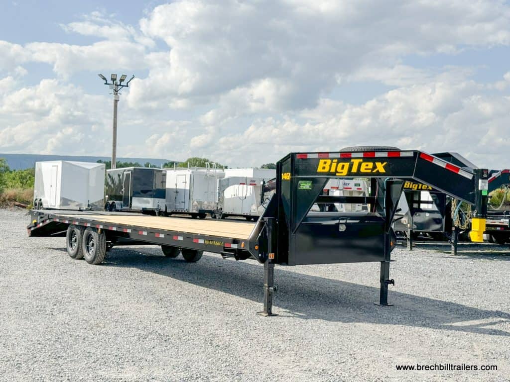 A 30ft long Big Tex 16K Tandem Axle Gooseneck Trailer