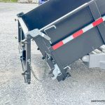 Spreader gate open on the Bwise 7x16 dump trailer.