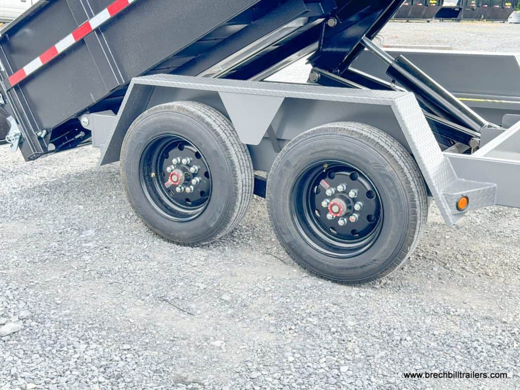 A new Bwise 7x16 DLP Heavy Duty Dump Trailer in the dump position.