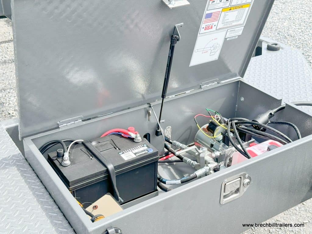 Battery box opened with access to hydraulic system
