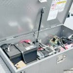 Battery box opened with access to hydraulic system