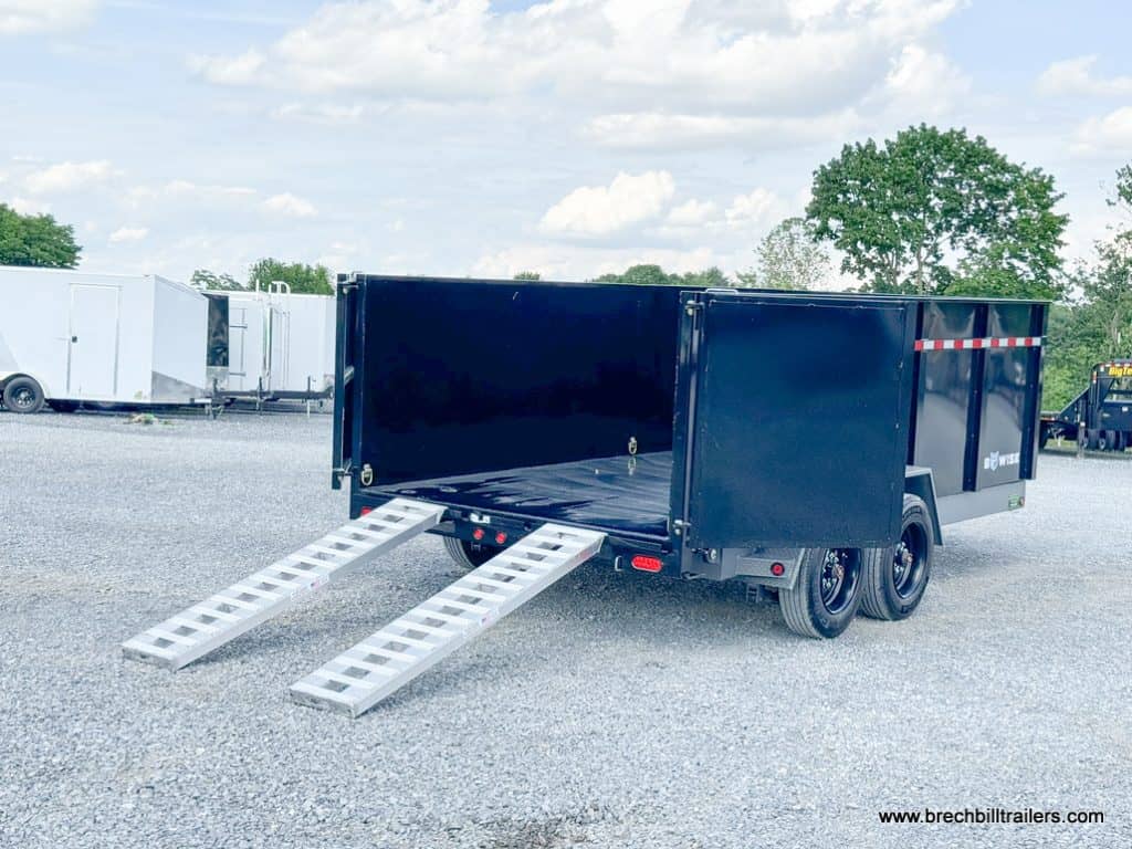 Back view of trailer with aluminum ramps.
