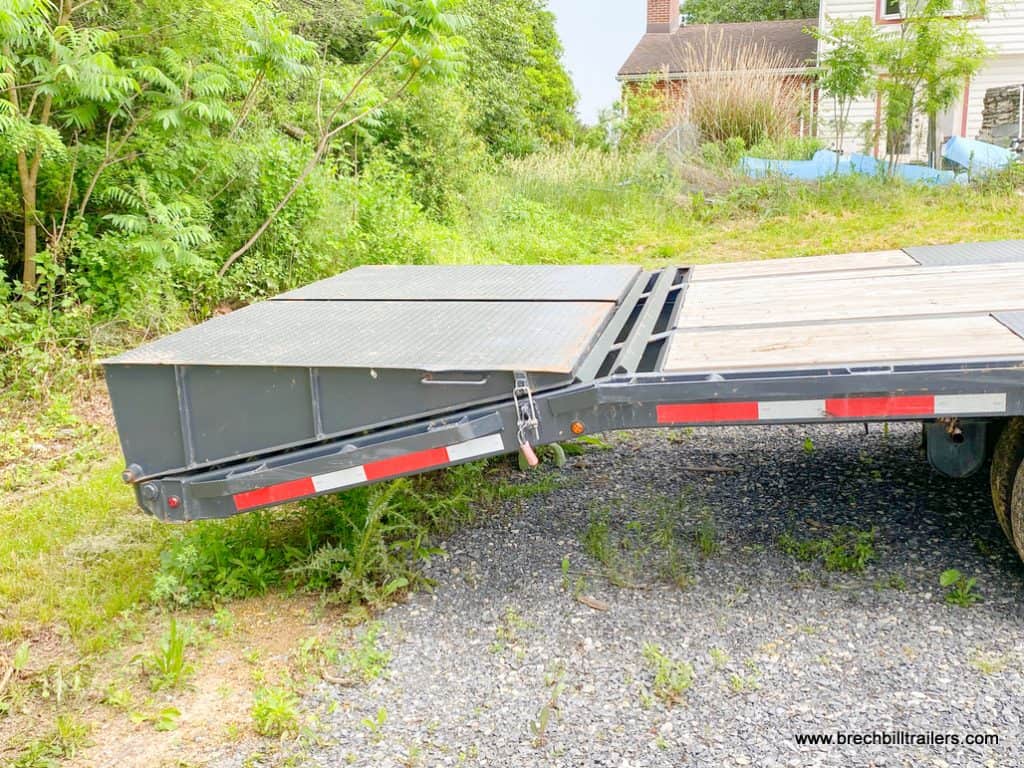 Side of ramps on the Used Belmont 26K Heavy Duty Gooseneck Trailer