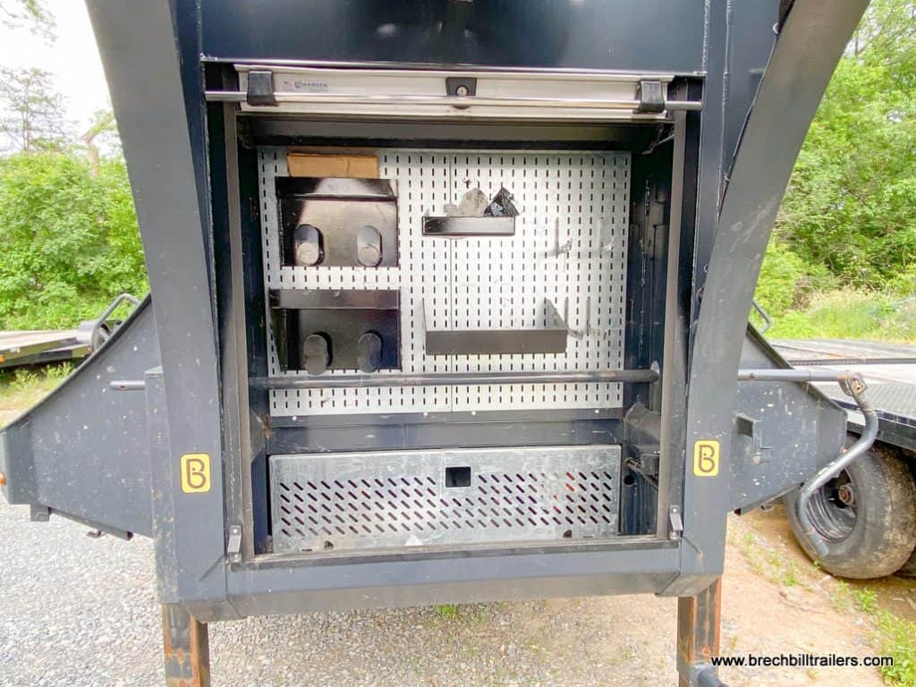 Front compartment open on the Used Belmont 26K Heavy Duty Gooseneck Trailer