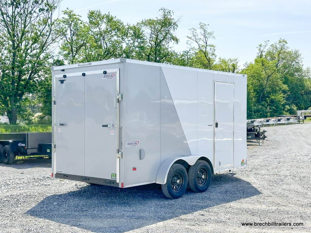 A white and silver Bravo 7K Scout Enclosed Cargo Trailer