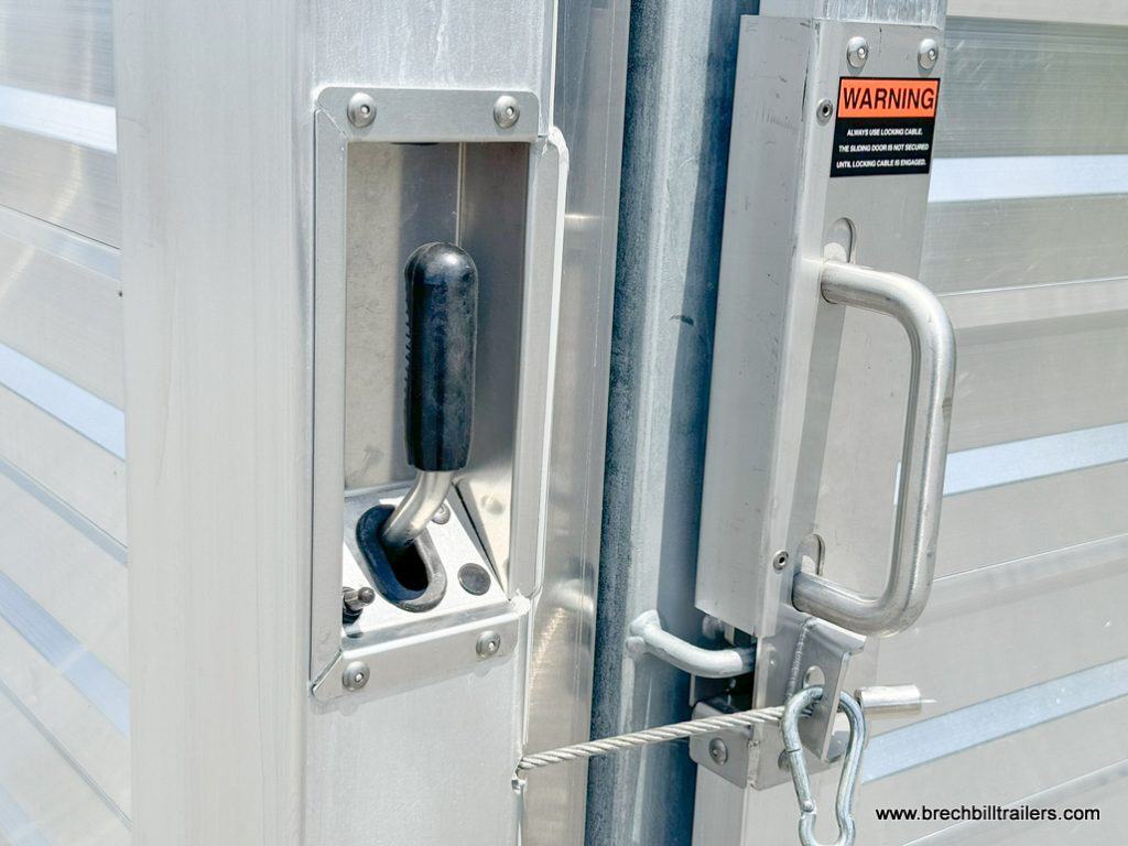 Door latch on the EBY 14K Maverick Gooseneck Livestock Trailer