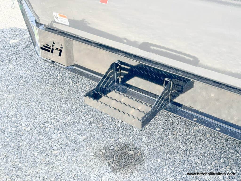 Step up on the trailer.