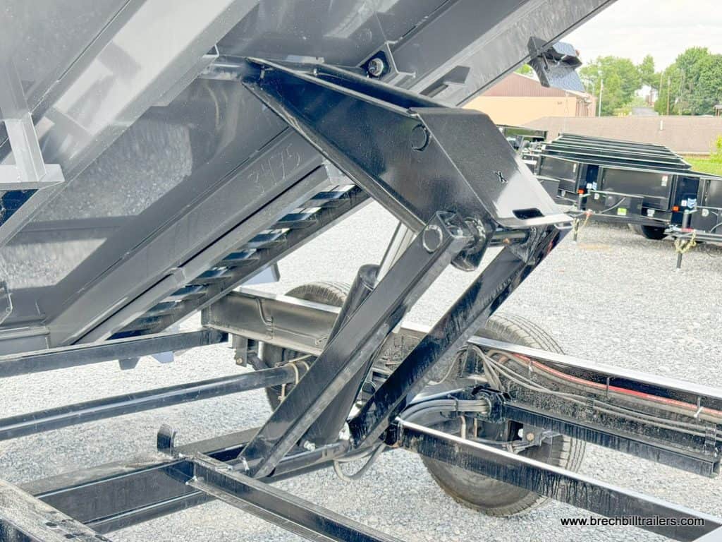 Cylinder raising the trailer into the dump position.