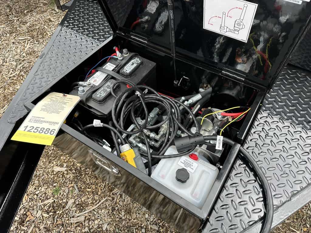The battery box and hydraulic system in a new Bwise tilt deck trailer.