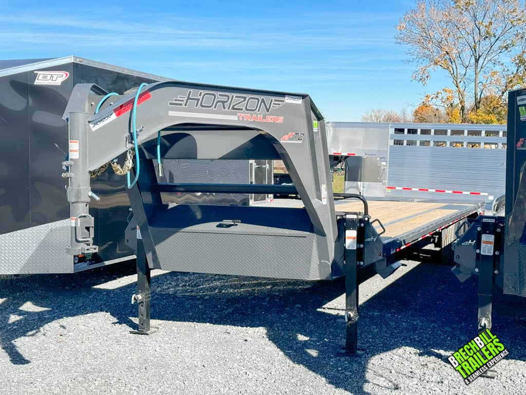 Gray Horizon flatdeck gooseneck trailer with wooden deck