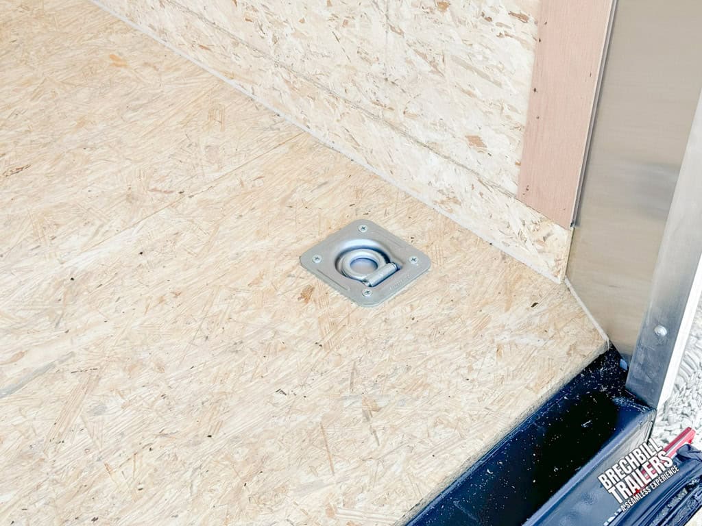Recessed d ring on the floor of the trailer.