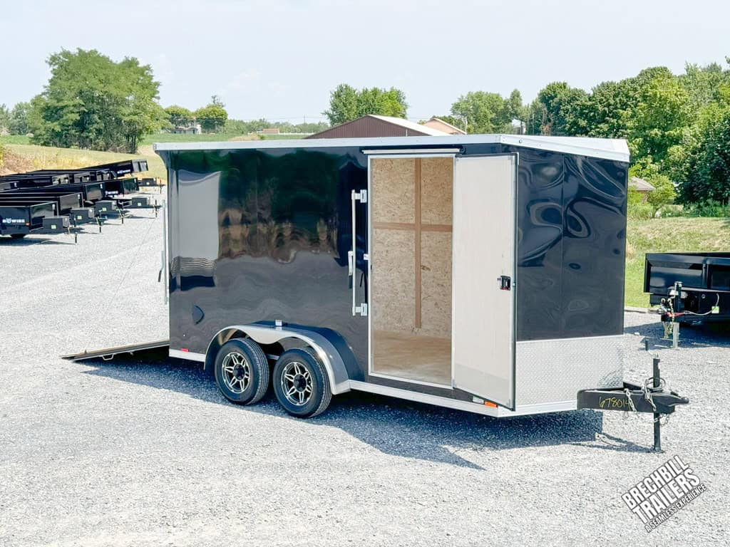 RC Flat Top Wedge Enclosed Cargo Trailer in black with dual axles.