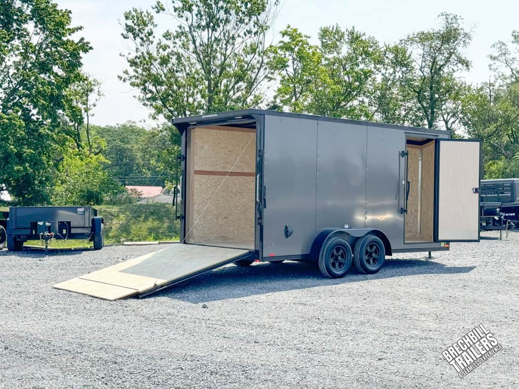 RC Flat Top Wedge Enclosed Cargo Trailer in the lot