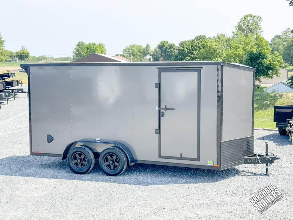 RC Flat Top Wedge Enclosed Cargo Trailer side view showing aluminum wheels.