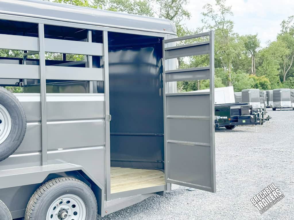 Opened door on a Valley 7x14 High Side Stock Trailer