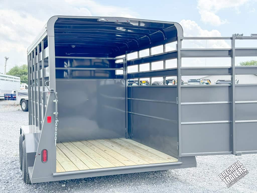 The Valley 7x14 High Side Stock Trailer from the back