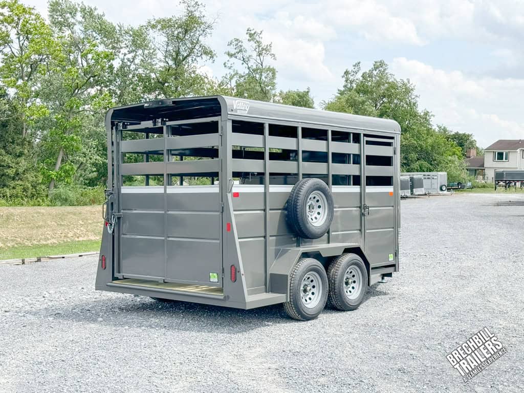Valley 7x14 High Side Stock Trailer with spare wheel mounted on the side.