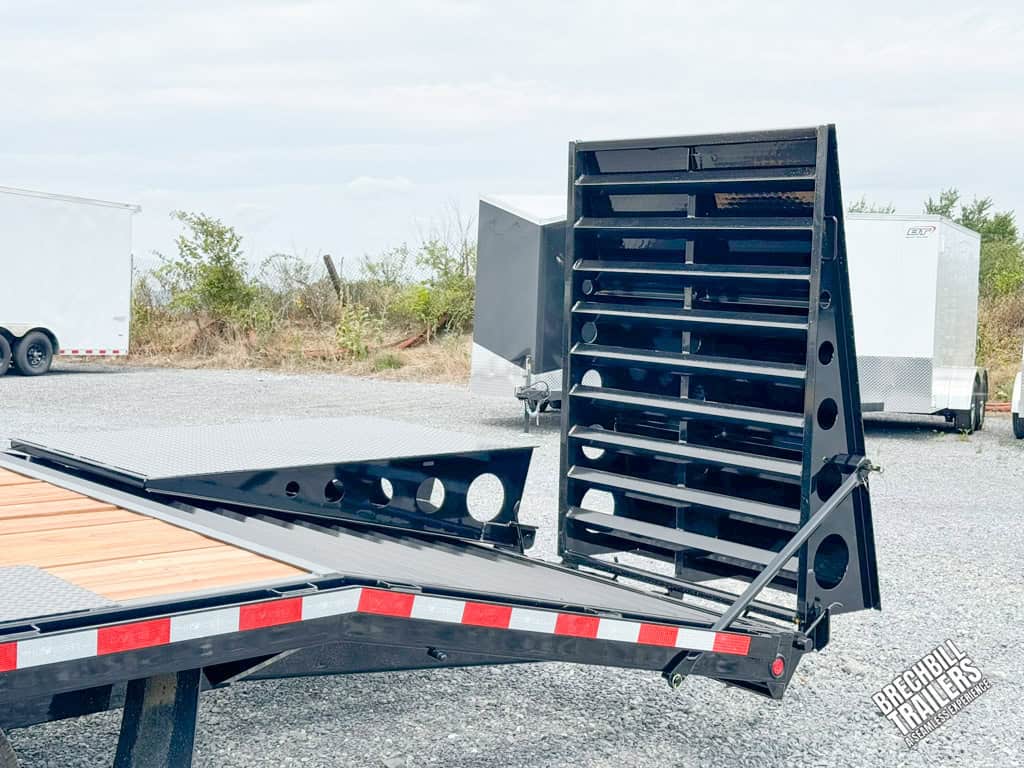 Black full width mega ramps folding out.