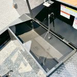 Open toolbox mounted on the Bwise 17K HD Deck Over Equipment Trailer