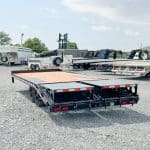 The Bwise 17K HD Deck Over Equipment Trailer parked in the lot.