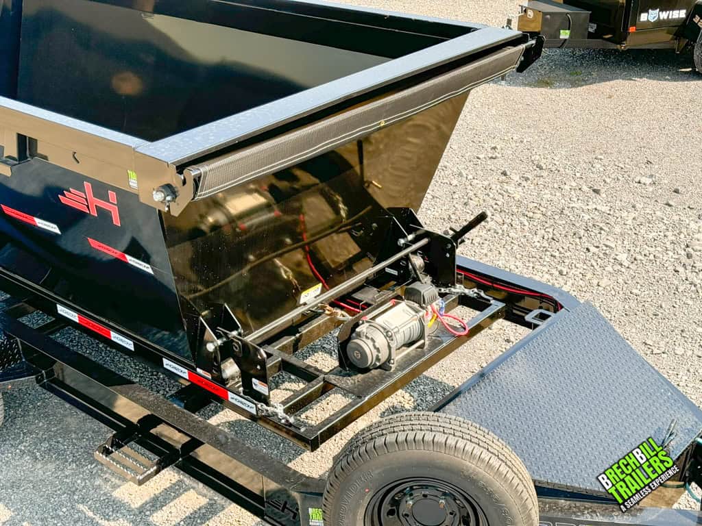The EDZ Horizon Roll Off Dumpster mounted on a roll off trailer.