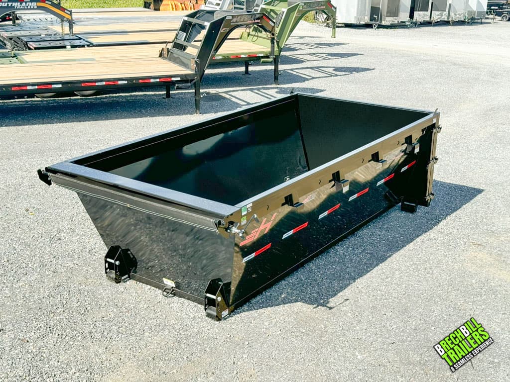 A brand new Horizon Roll Off Dumpster with a tarp kit installed.