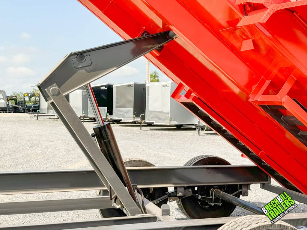 New orange box trailer in the dumping position.