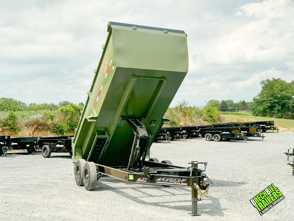 Cylinder extended to tilt the trailer into the dump position.
