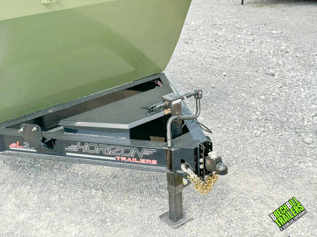 Front of the Horizon 14k Heavy Duty Dump Trailer with a close up view of the jack
