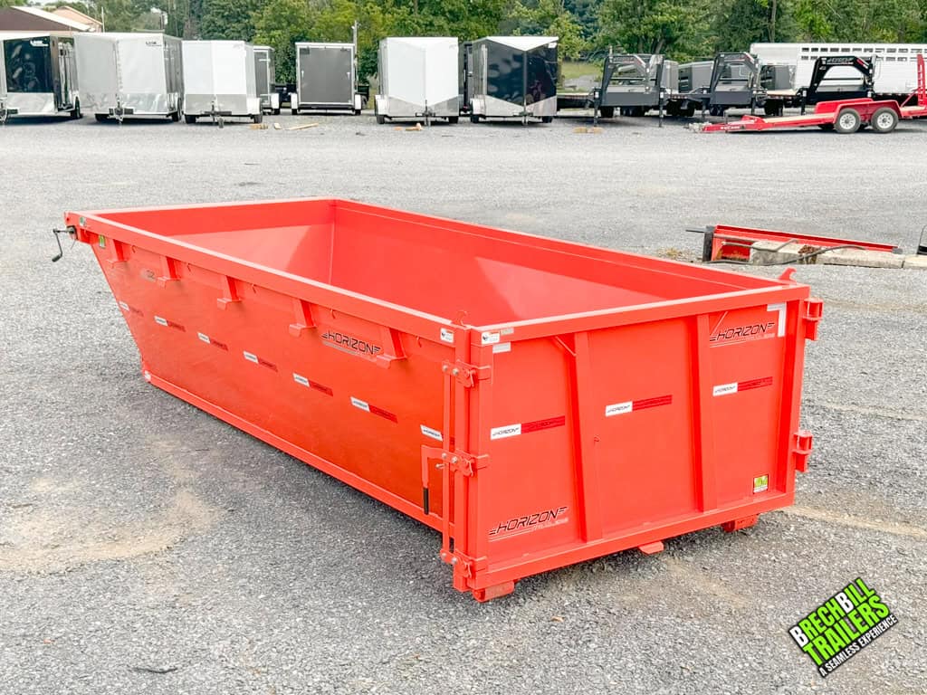 A brand new Horizon Roll Off Dumpster on the ground.