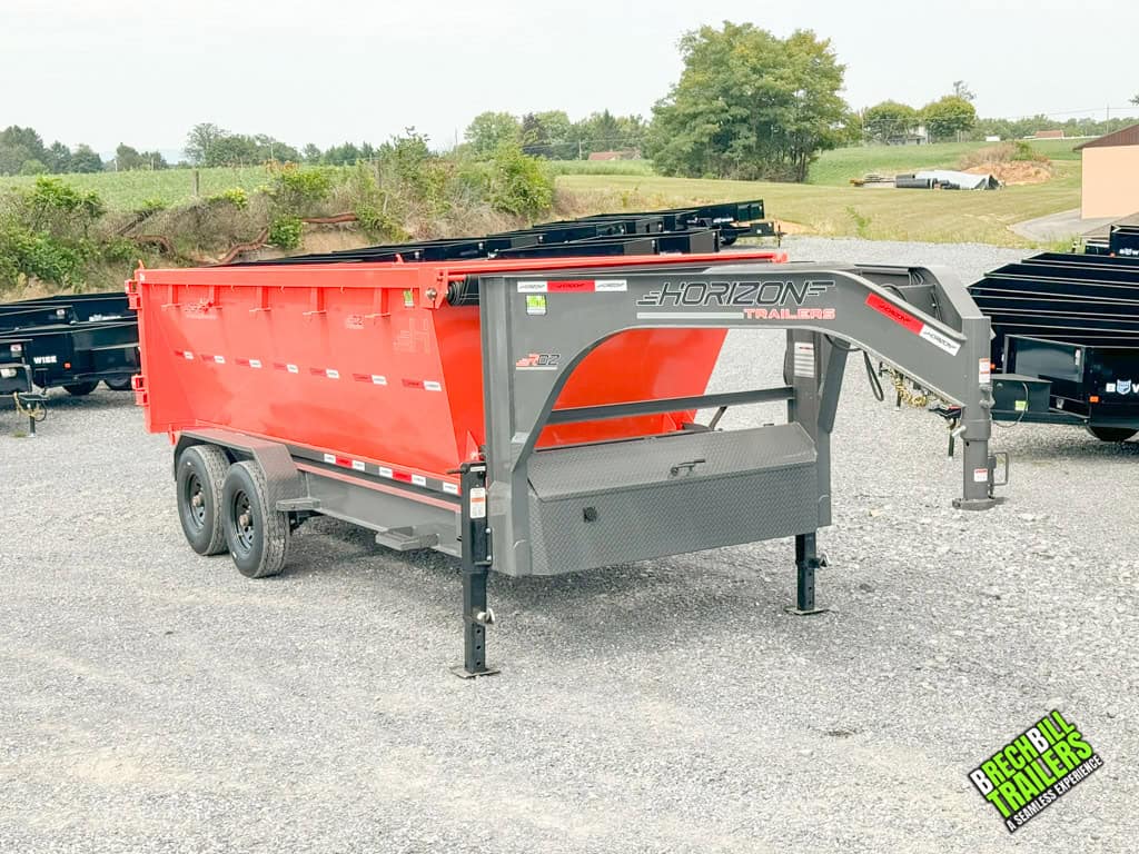 The Horizon Roll Off Dumpster loaded on a trailer.