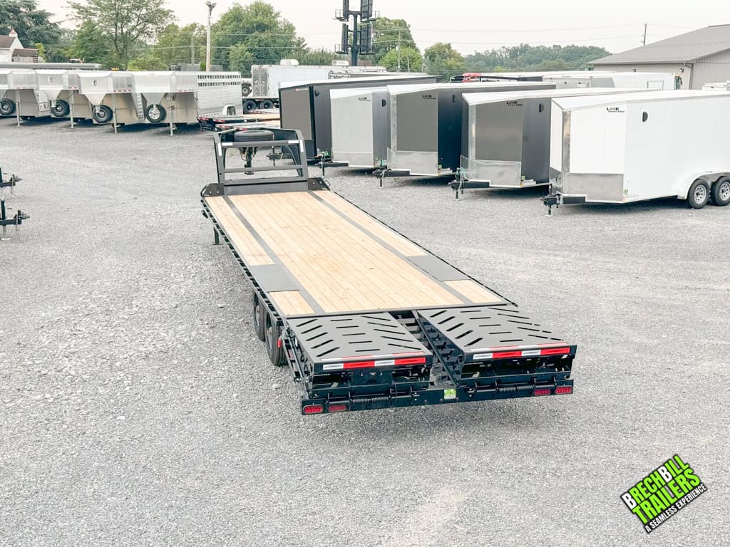 Complete view of the trailer's deck and ramps from the back.