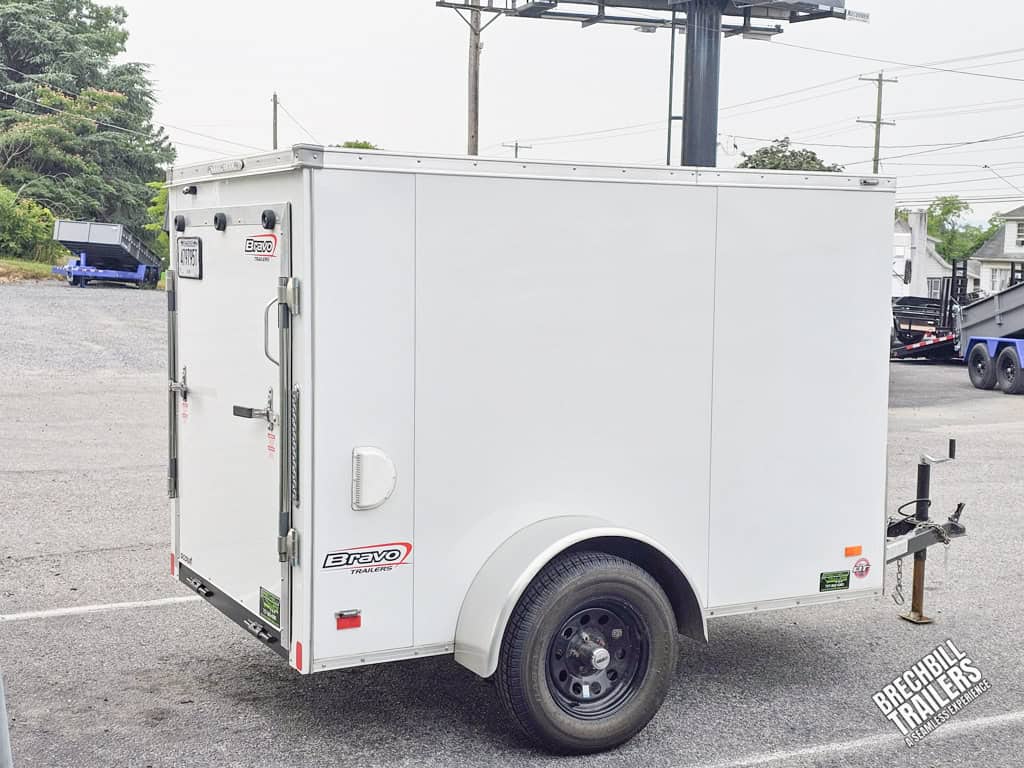 A used Bravo Scout Enclosed Cargo Trailer