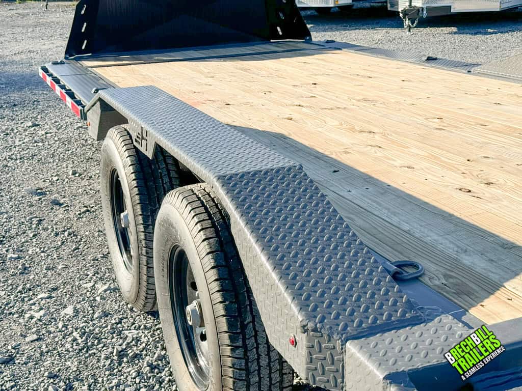Wheel wells and wood deck on a new Horizon 20ft Low Pro Equipment Trailer