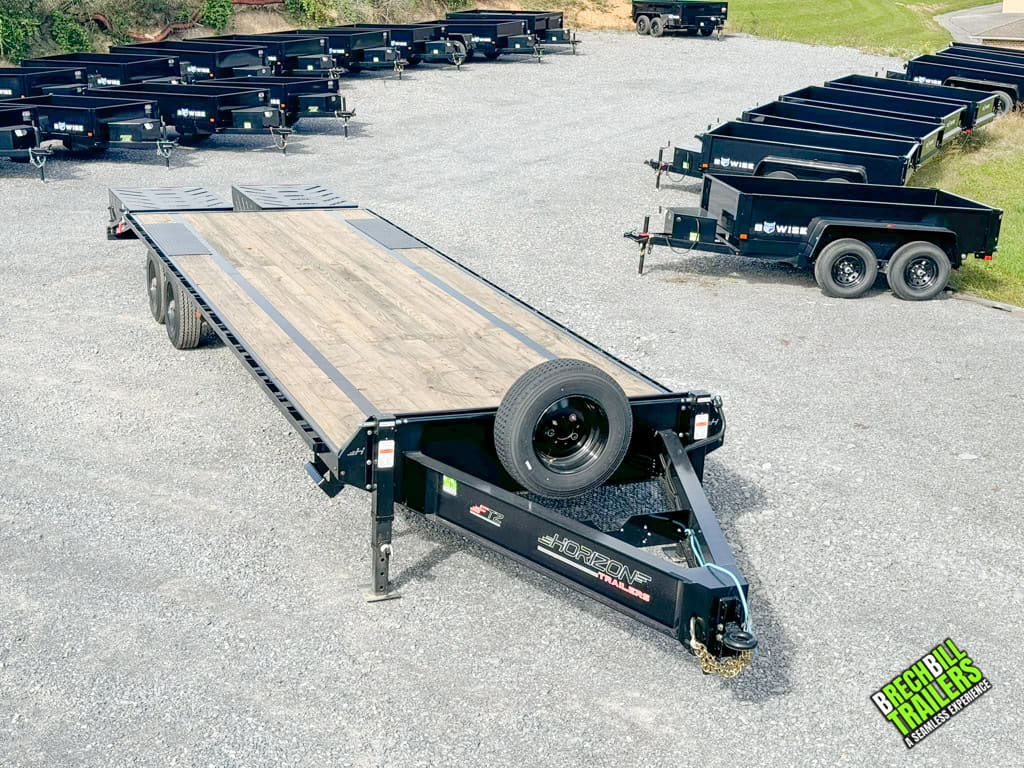 A new Horizon 30ft Dual Axle Bumper Pull Trailer parked and ready for pickup.