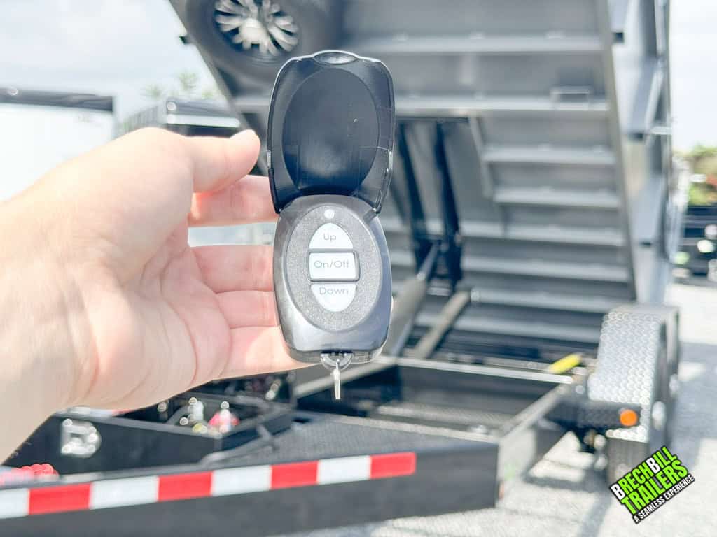 Remote control trailer key with up down and on/off switch.