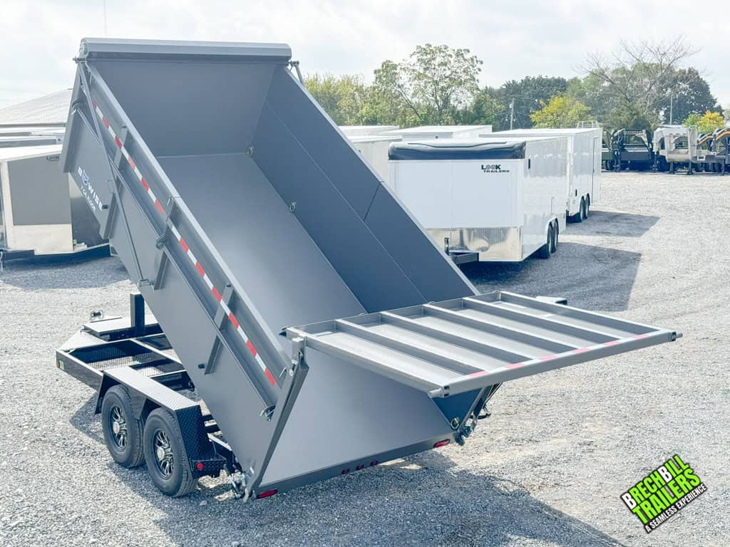 Bwise DU 15.4K Ultimate Dump Trailer in the dump position with the gate open.