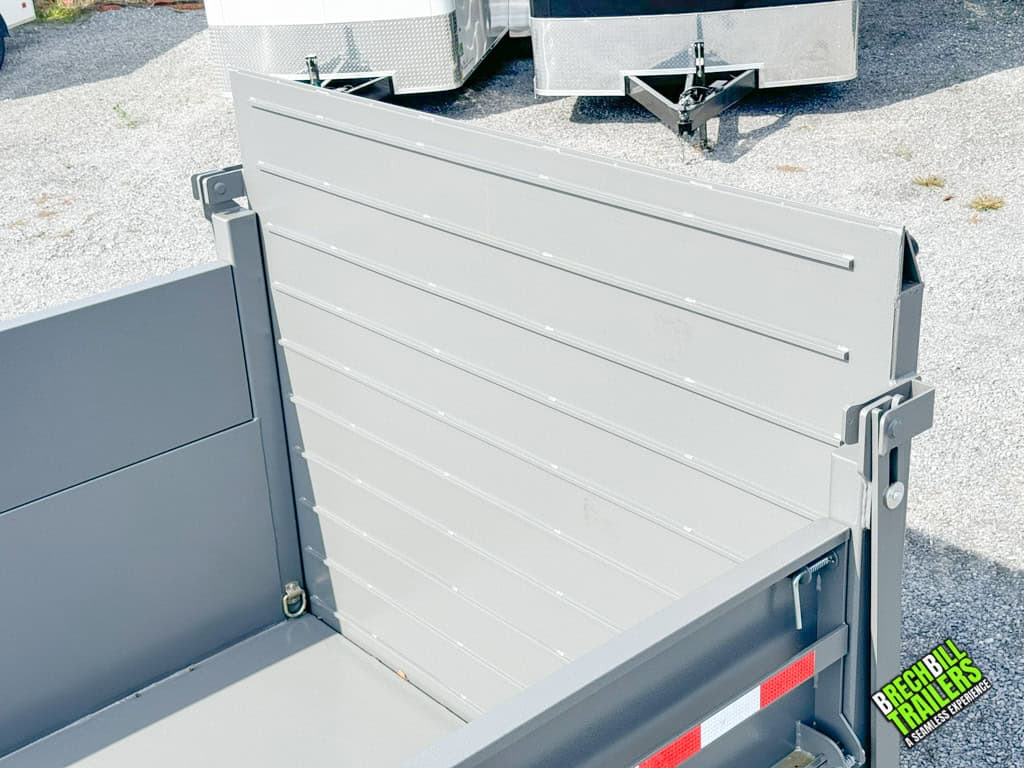 The back gate on the Bwise DU 15.4K Ultimate Dump Trailer.