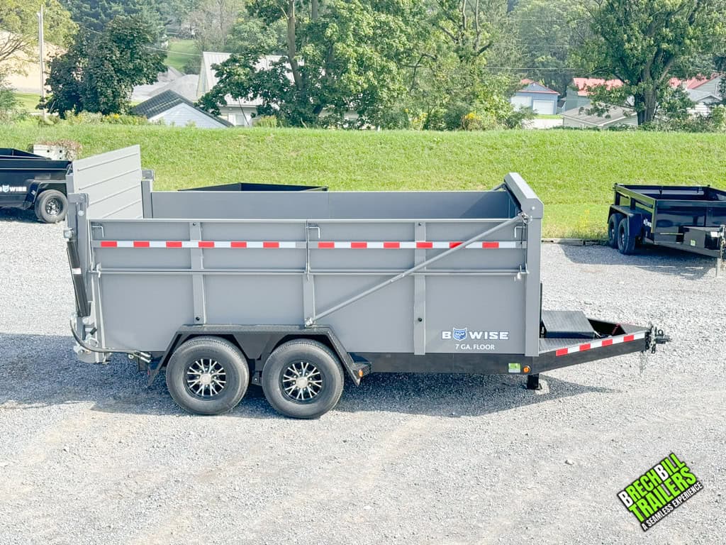 Side view of the Bwise DU 15.4K Ultimate Dump Trailer with the Bwise decal.