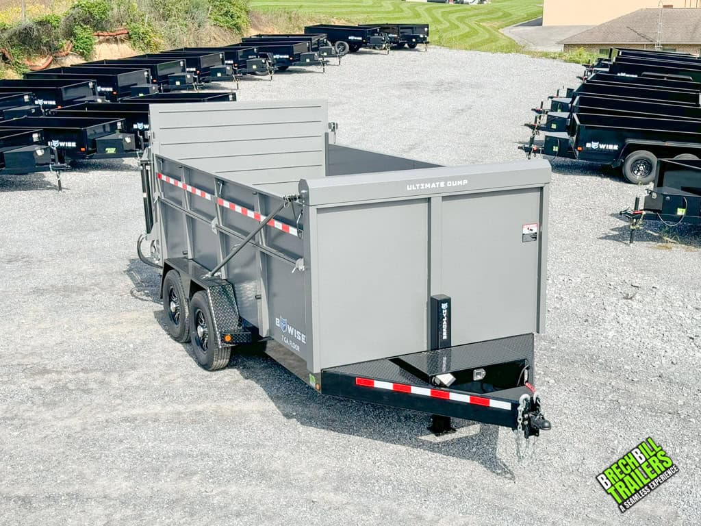 Front view of a brand new 7x14 Bwise DU 15.4K Ultimate Dump Trailer.